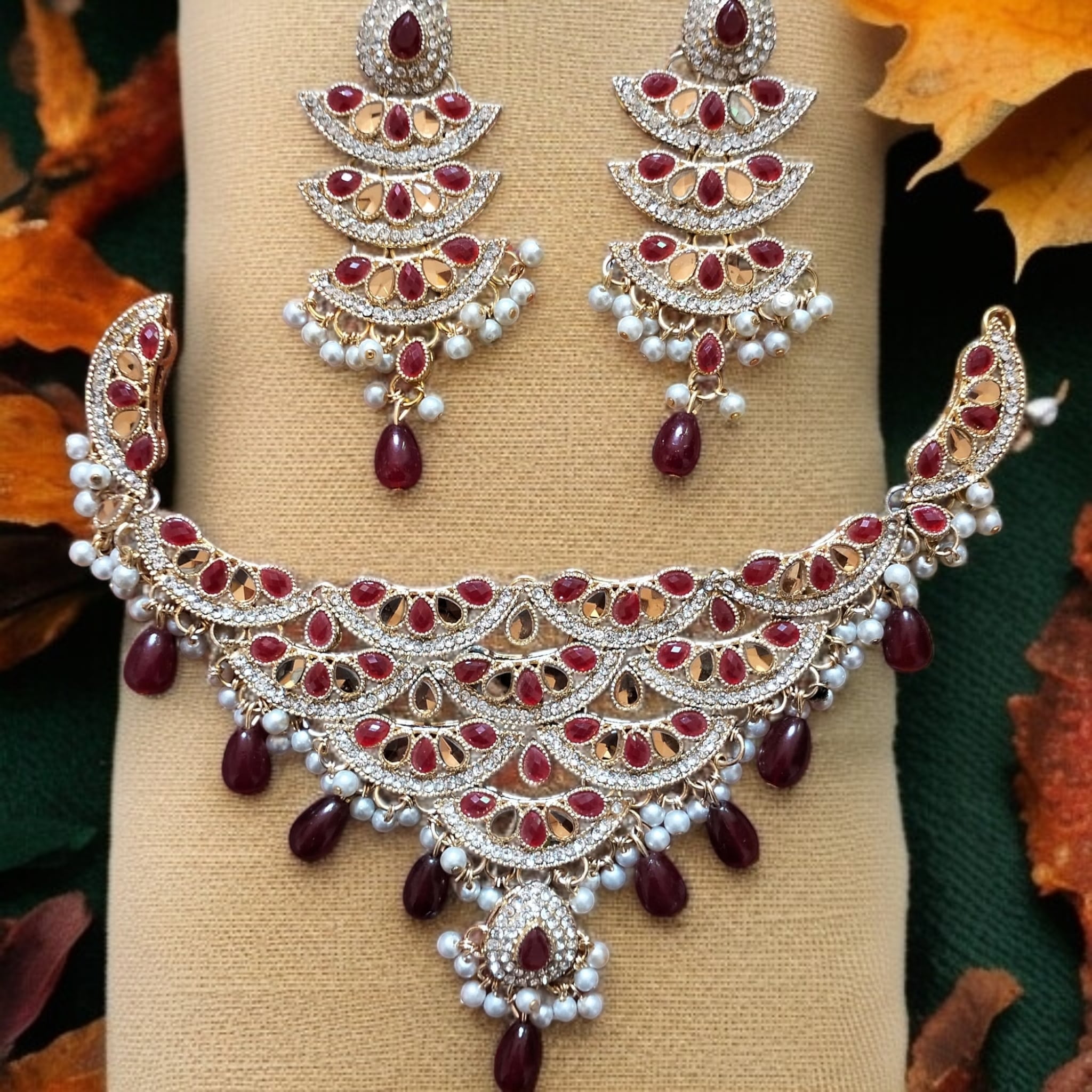Buy Red and Golden colour jewellery set with necklace and earrings at best price in Pakistan