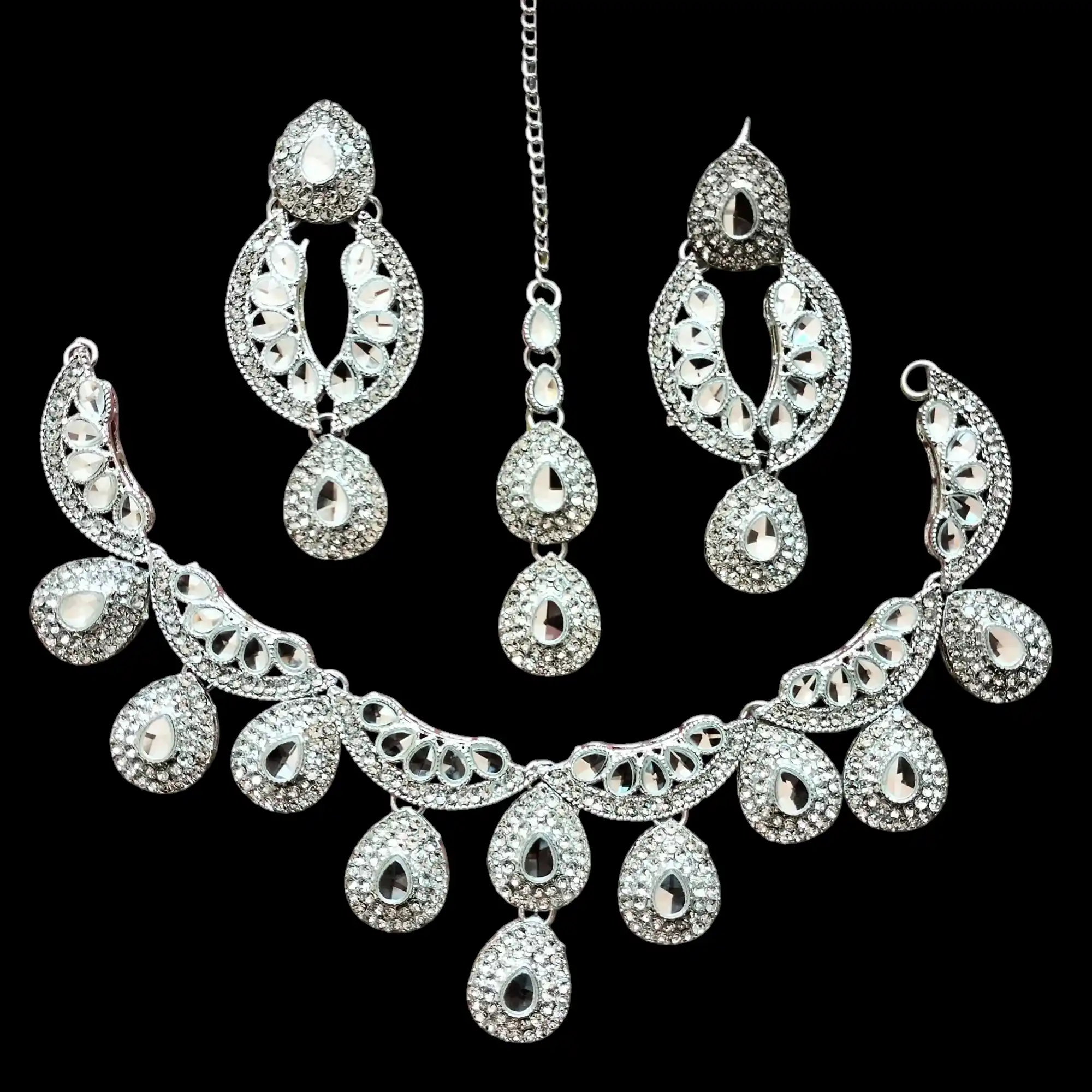 Buy White colour jewellery set with necklace , earrings and tikka at best price in Pakistan