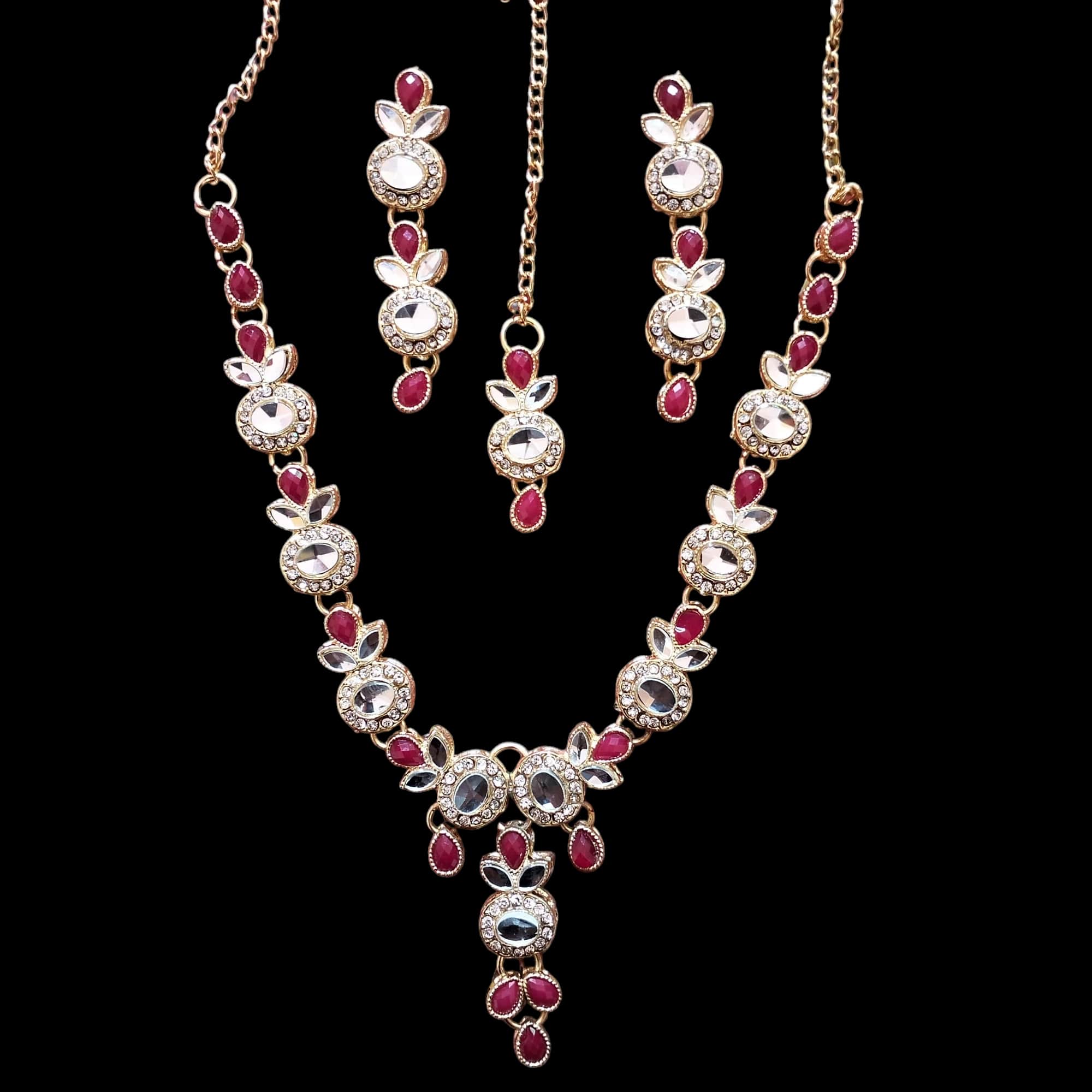 Buy Red and Golden colour jewellery set with necklace , earrings and tikka at best price in Pakistan